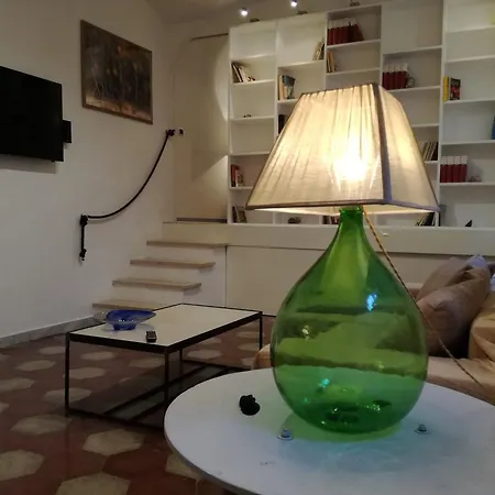 Апартаменты Caprera House Garden