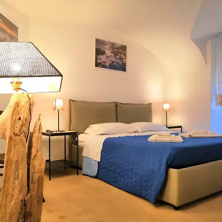 Апартаменты Caprera House Garden *